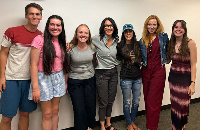 Group of students smiling at camera